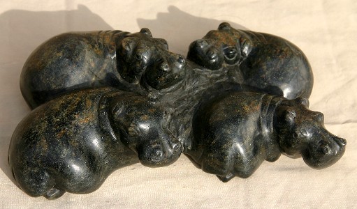 Group of Four Hippos Chilling Out